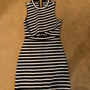 Black and white striped dress. Form fitting